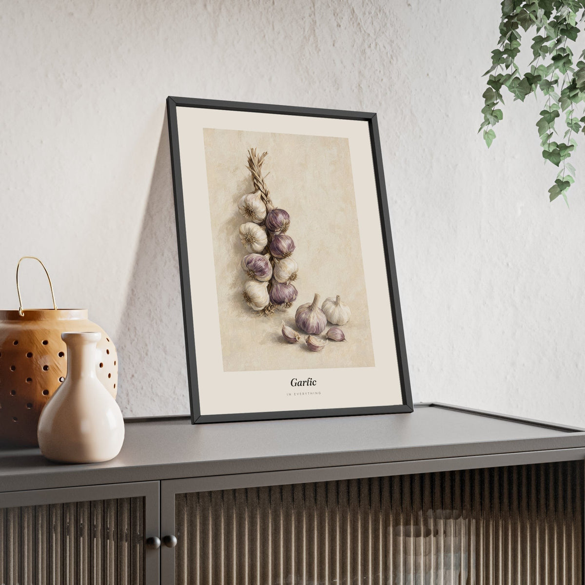 Garlic Print framed and leaning on a sideboard