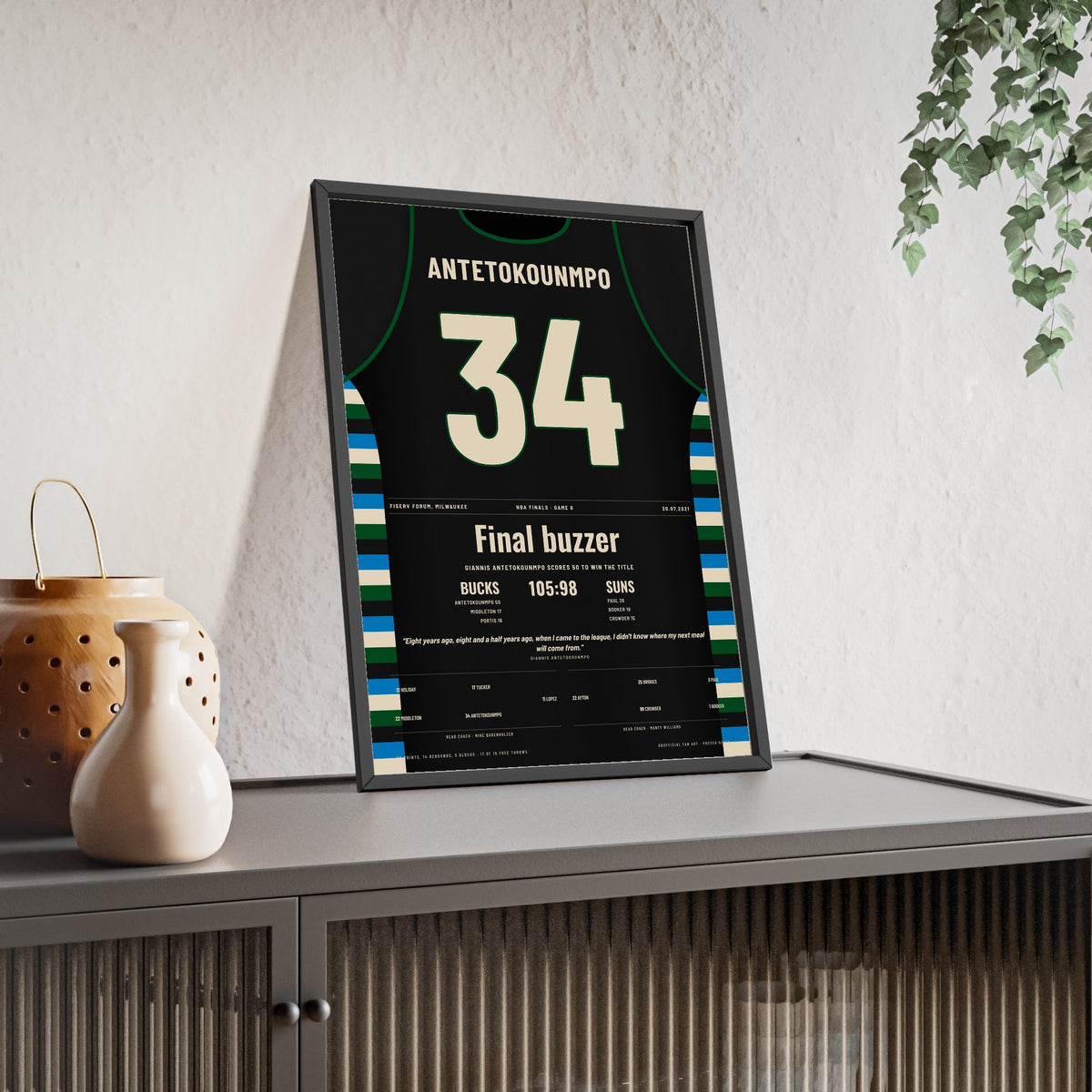 Giannis Antetokounmpo 2021 NBA Finals Game 6 Poster - Milwaukee Bucks 34 50 Points Jersey Print framed and leaning on a sideboard