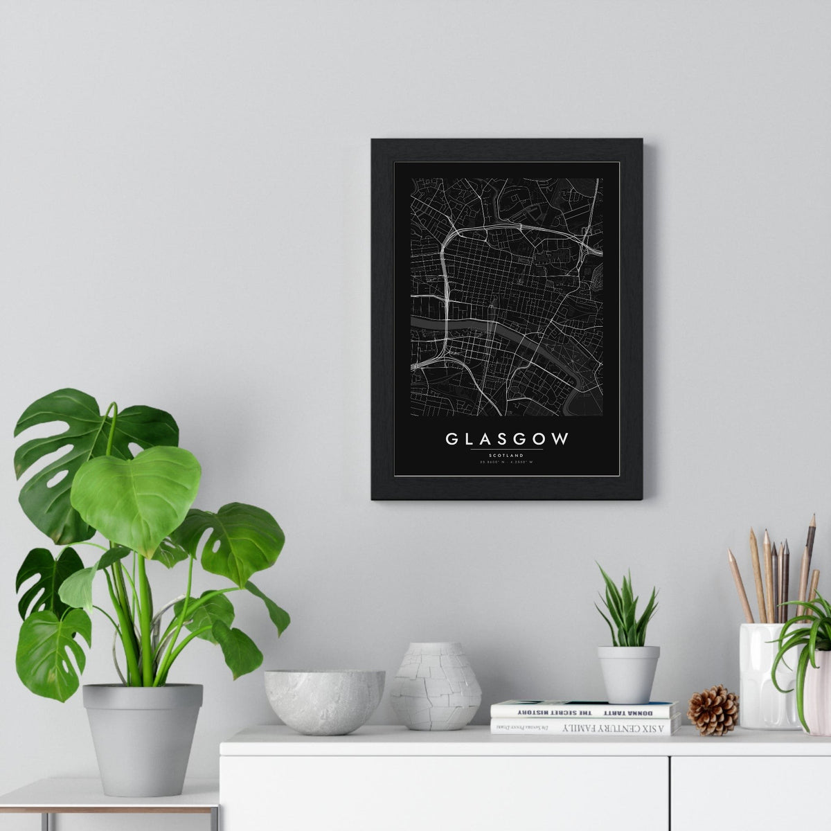 Glasgow street map poster in black, minimal city map print framed on a living room wall