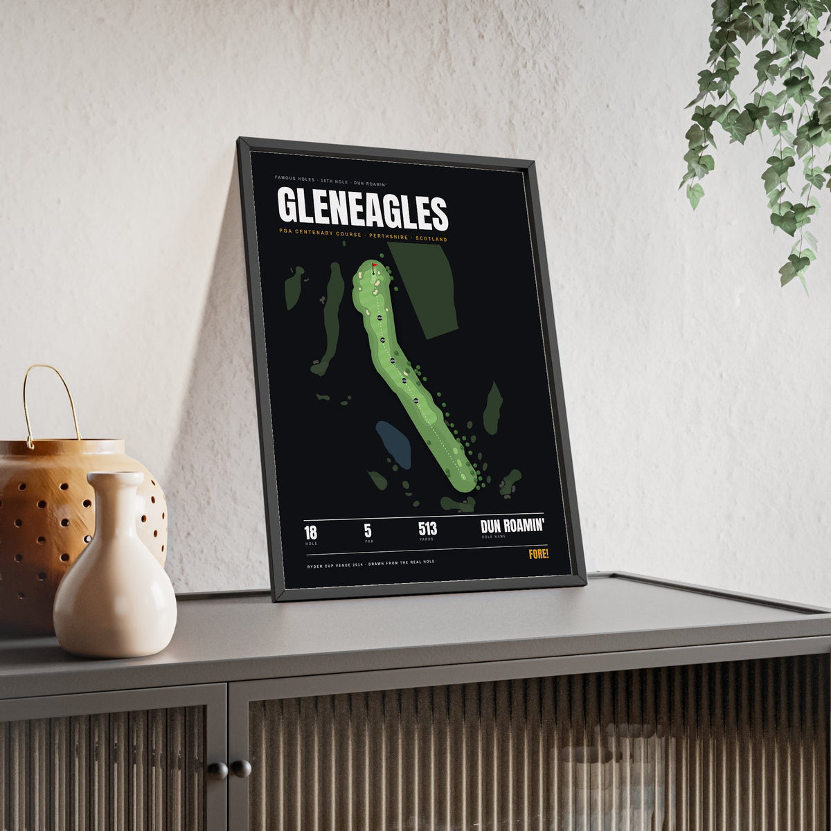Gleneagles 18th Hole print framed and leaning on a sideboard