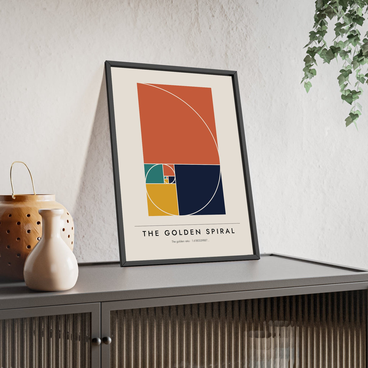 Golden Spiral print framed and leaning on a sideboard