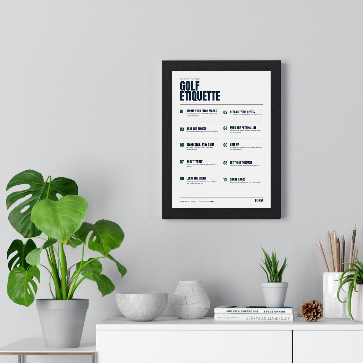 Golf Etiquette print framed on a living room wall