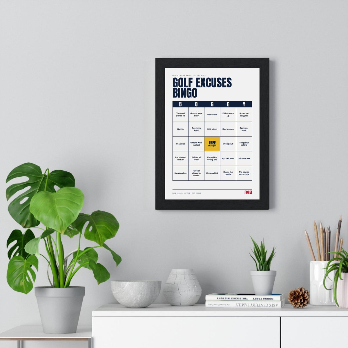 Golf Excuses Bingo print framed on a living room wall
