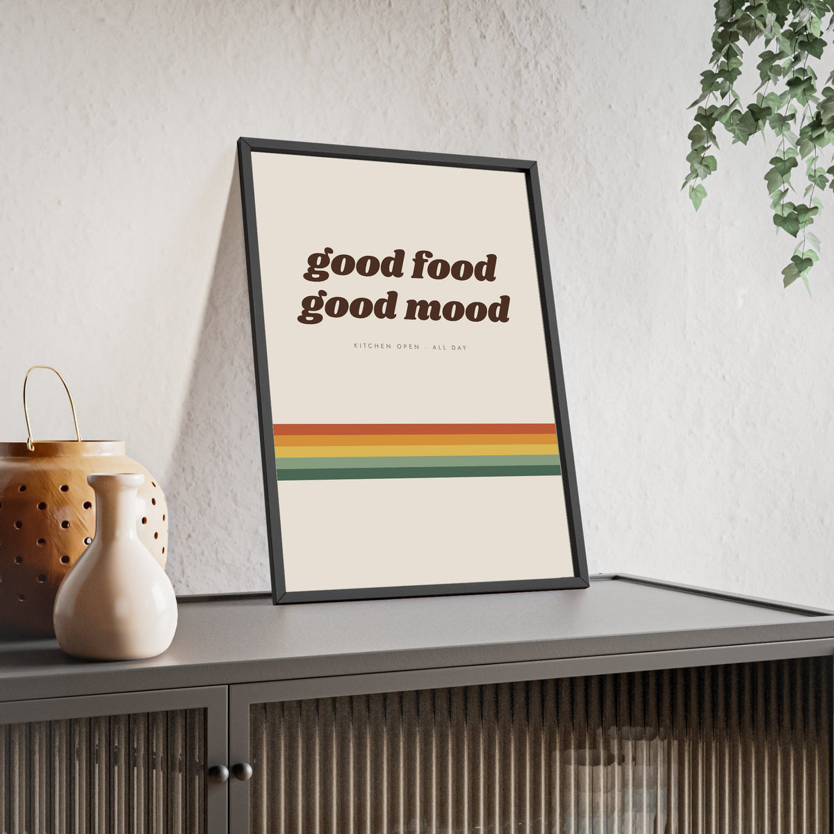 Good Food Good Mood Print framed and leaning on a sideboard