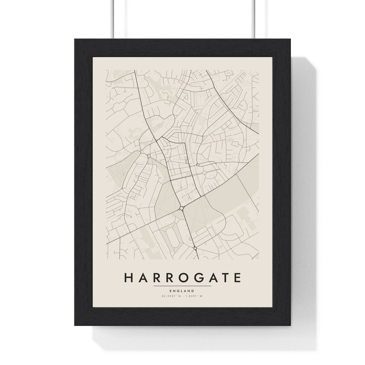 Harrogate street map poster in cream, minimal city map print framed in a black frame
