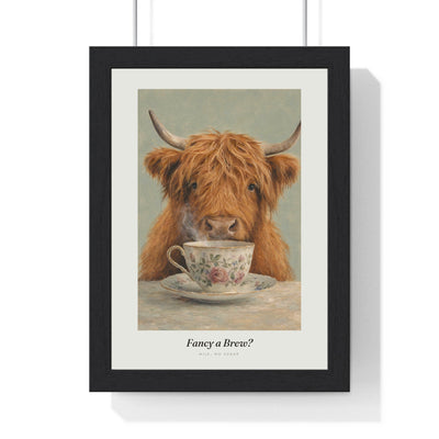 Highland Cow Tea Print framed in a black frame, ready to hang