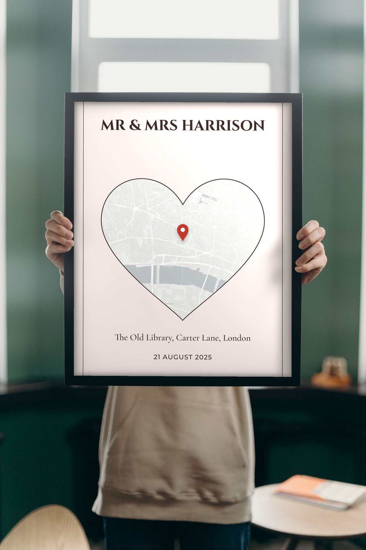 Personalised Wedding Venue Heart Map Print - Lifestyle - held up in a bright room