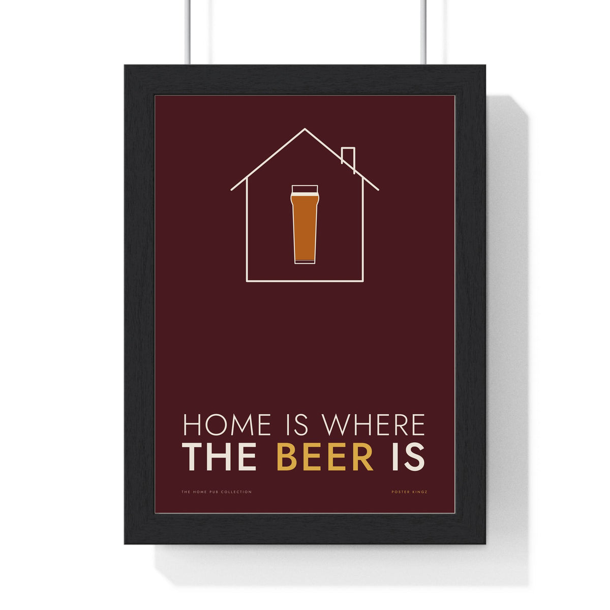 Home Is Where The Beer Is Print framed in a black frame, ready to hang