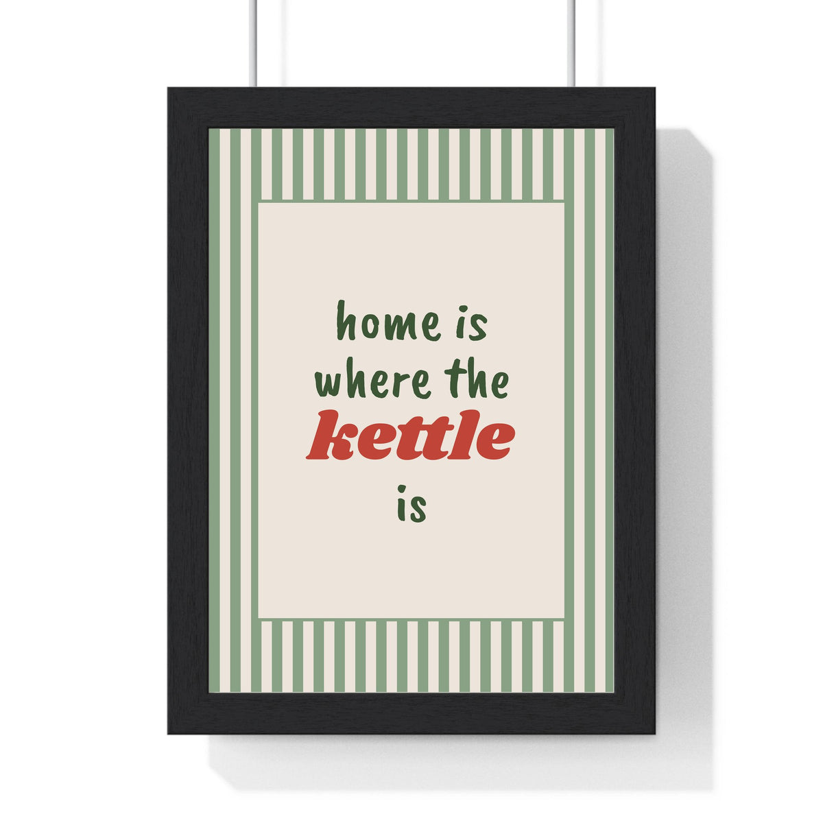Home Is Where the Kettle Is Print framed in a black frame, ready to hang