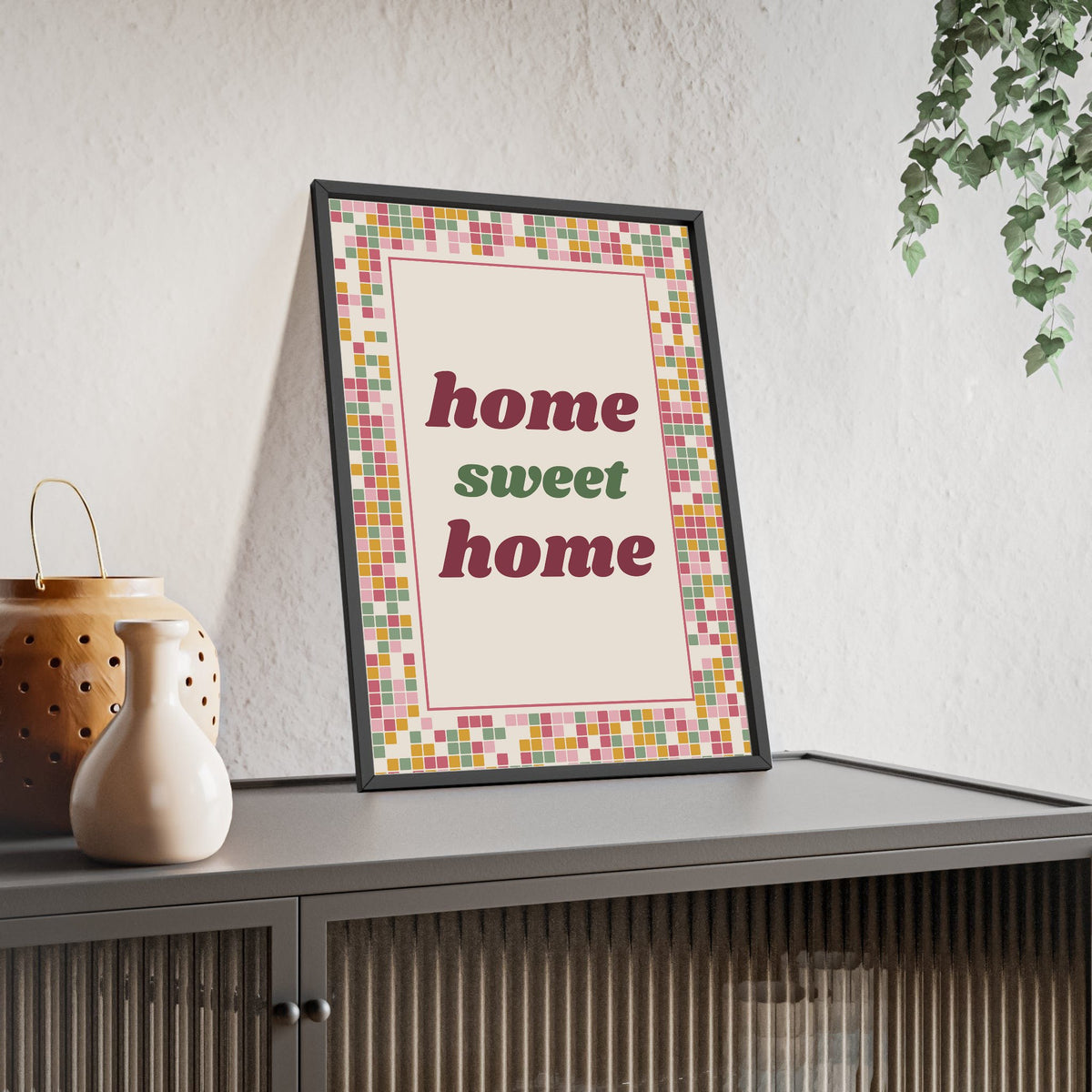 Home Sweet Home Print framed and leaning on a sideboard