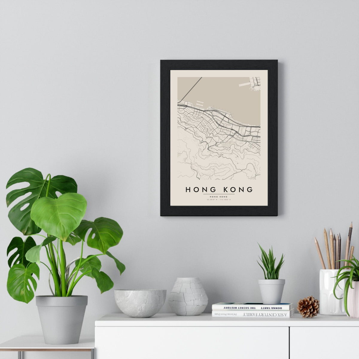 Hong Kong street map poster in cream, minimal city map print framed on a living room wall
