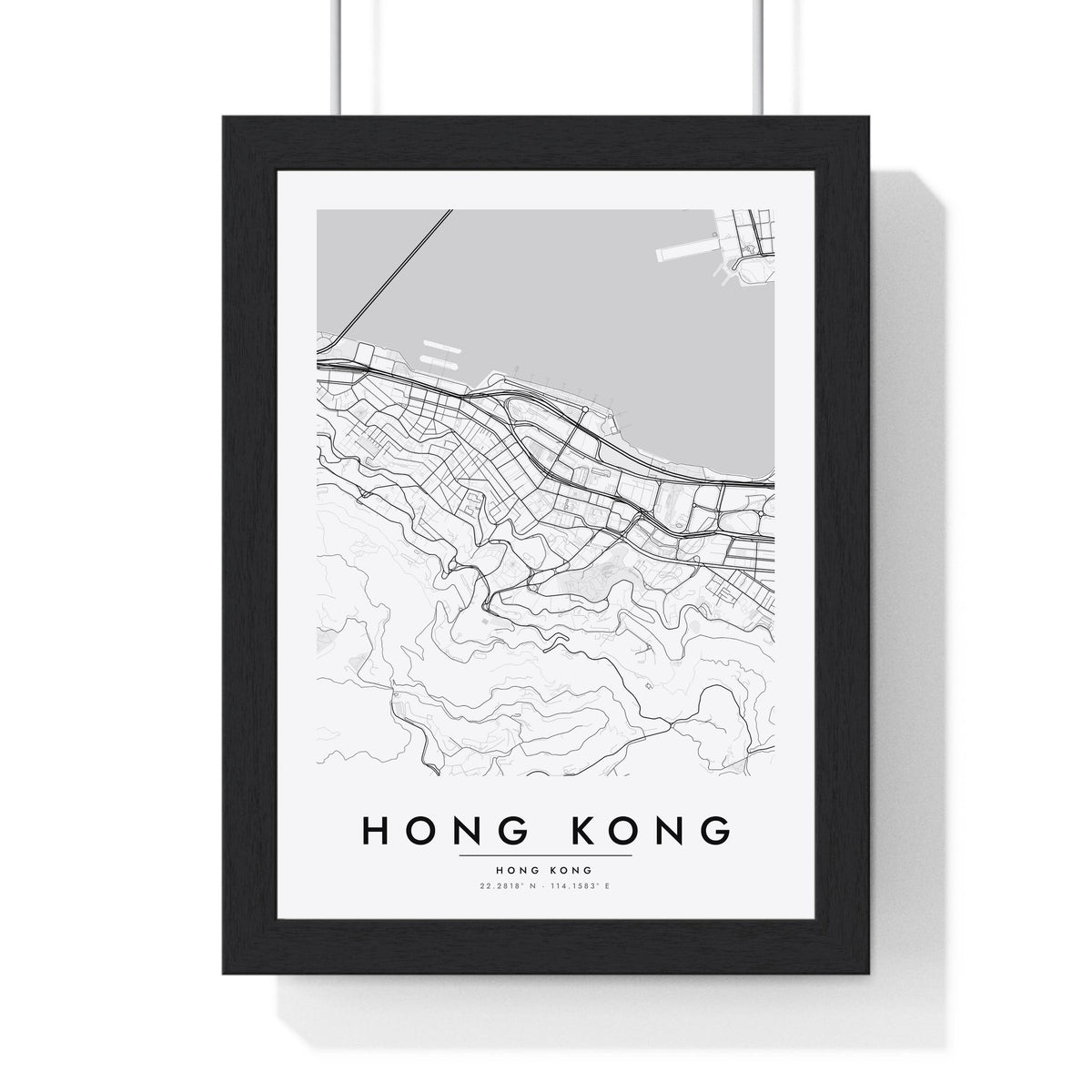Hong Kong street map poster in white, minimal city map print framed in a black frame