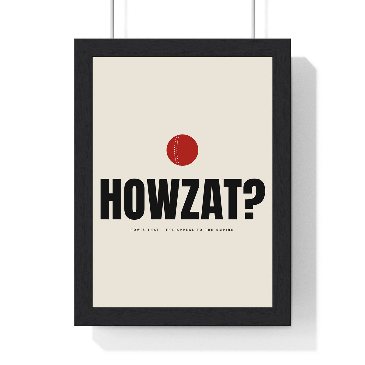 Howzat Cricket print framed in a black frame, ready to hang