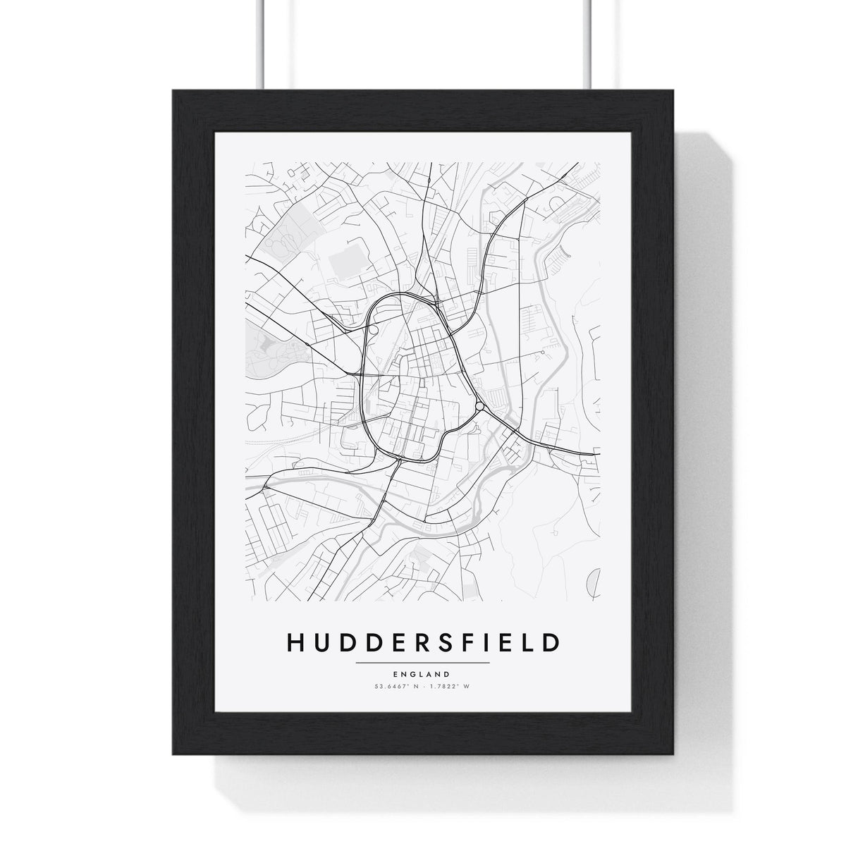 Huddersfield street map poster in white, minimal city map print framed in a black frame