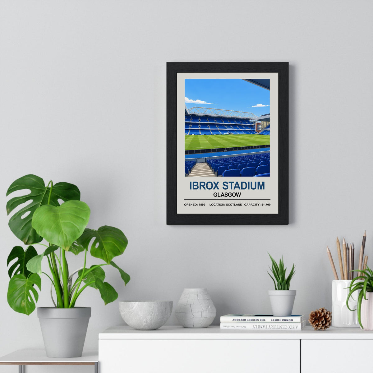 Rangers Ibrox Stadium print framed on a living room wall