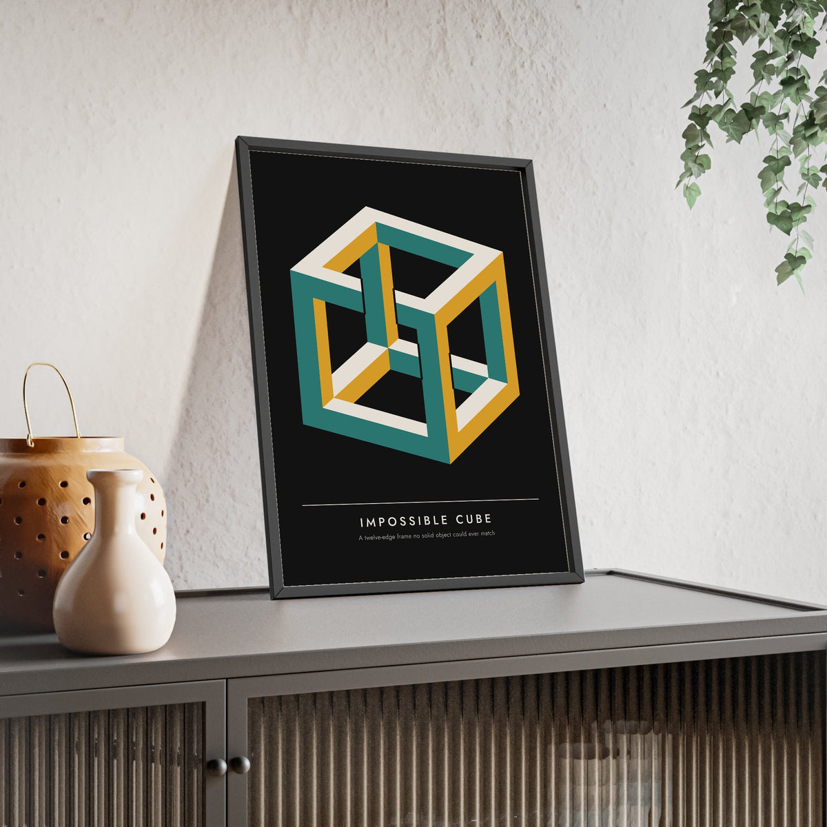 Impossible Cube print framed and leaning on a sideboard