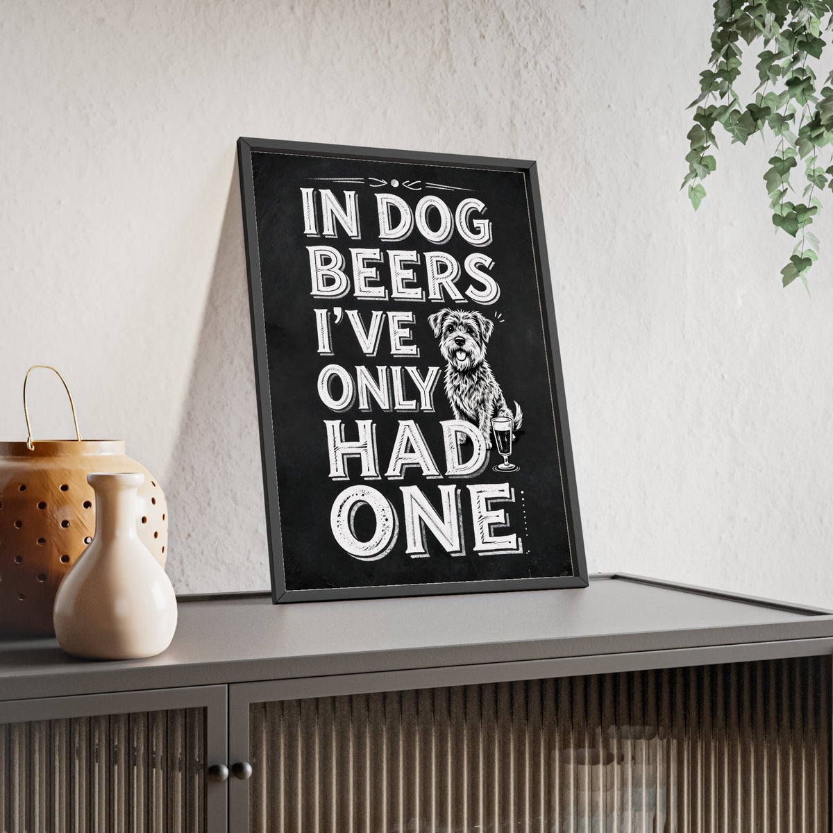 In Dog Beers I've Only Had One Print framed and leaning on a sideboard