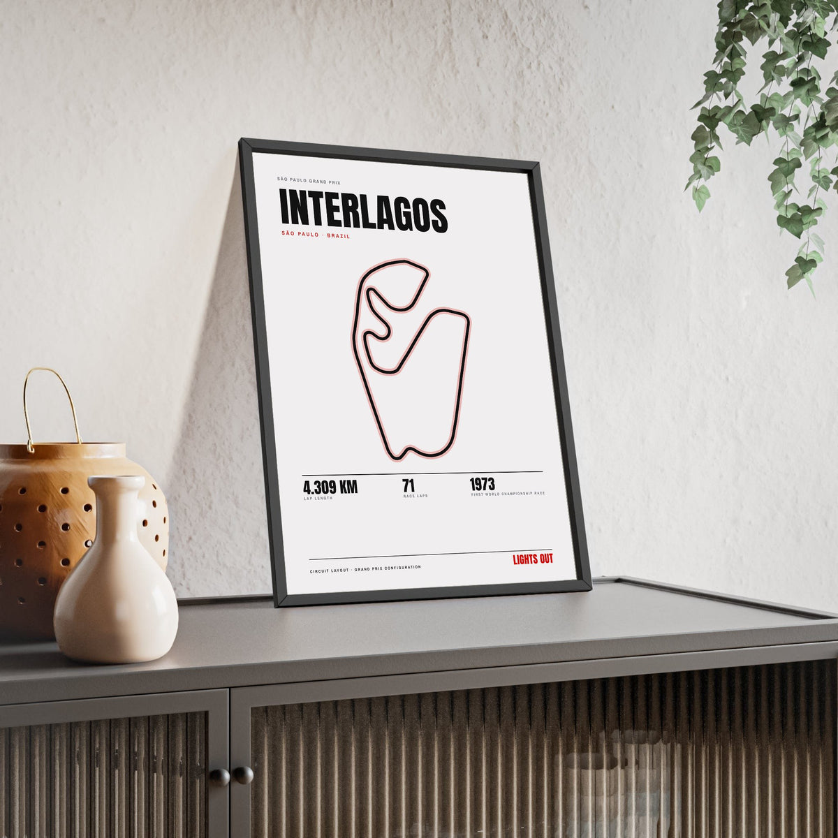 Interlagos Circuit print White framed and leaning on a sideboard