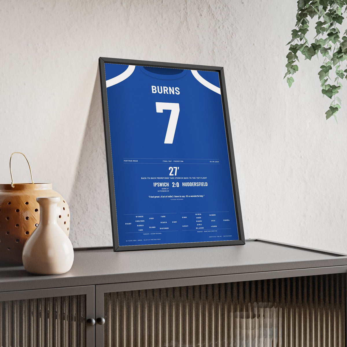 Ipswich Town Burns 7 Promotion 2024 Poster framed and leaning on a sideboard