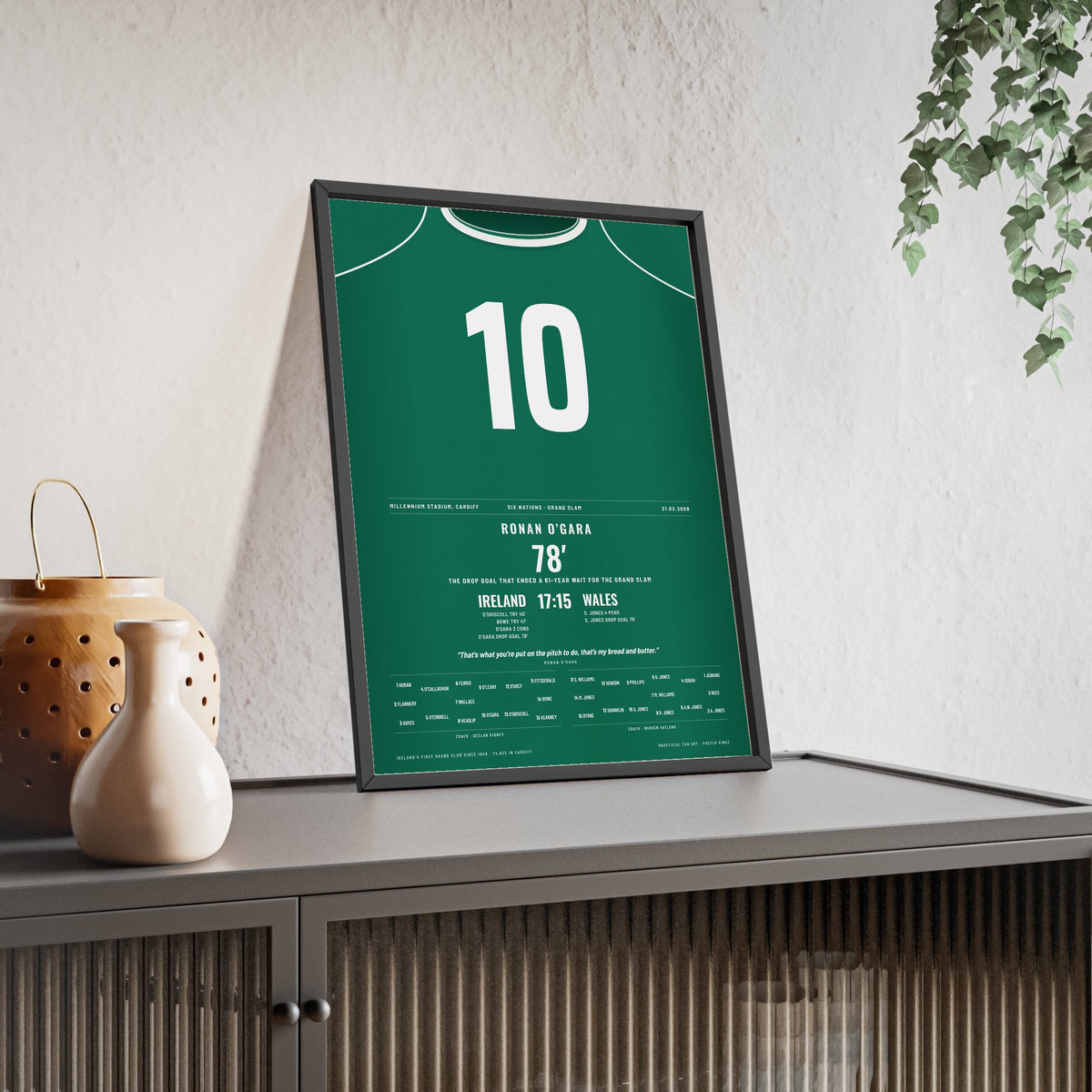 Ireland Grand Slam 2009 Poster - Ronan O’Gara 10 Drop Goal v Wales Cardiff Rugby Print framed and leaning on a sideboard
