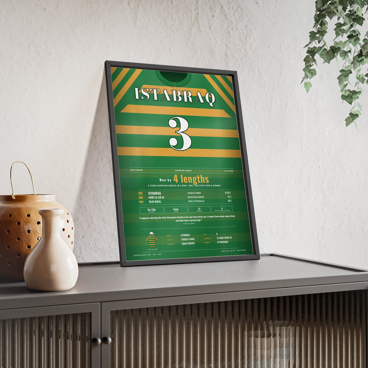 Istabraq Champion Hurdle 2000 Horse Racing Poster - Third in a Row Silks Print framed and leaning on a sideboard