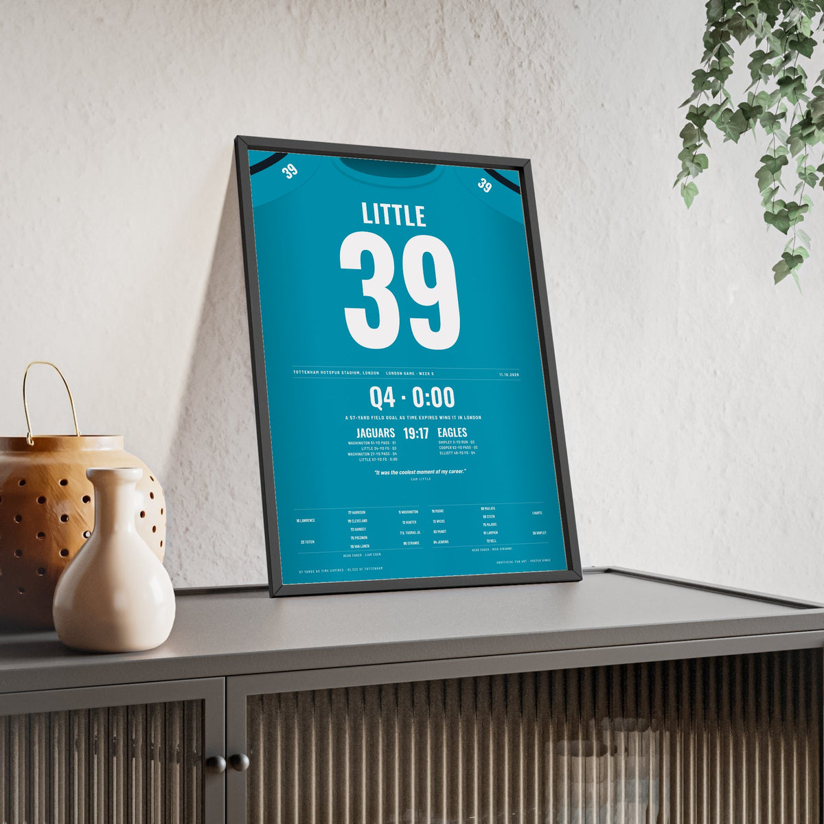 Jacksonville Jaguars London 2026 Poster - Cam Little 39 Tottenham v Eagles Winning Kick Jersey Print framed and leaning on a sideboard
