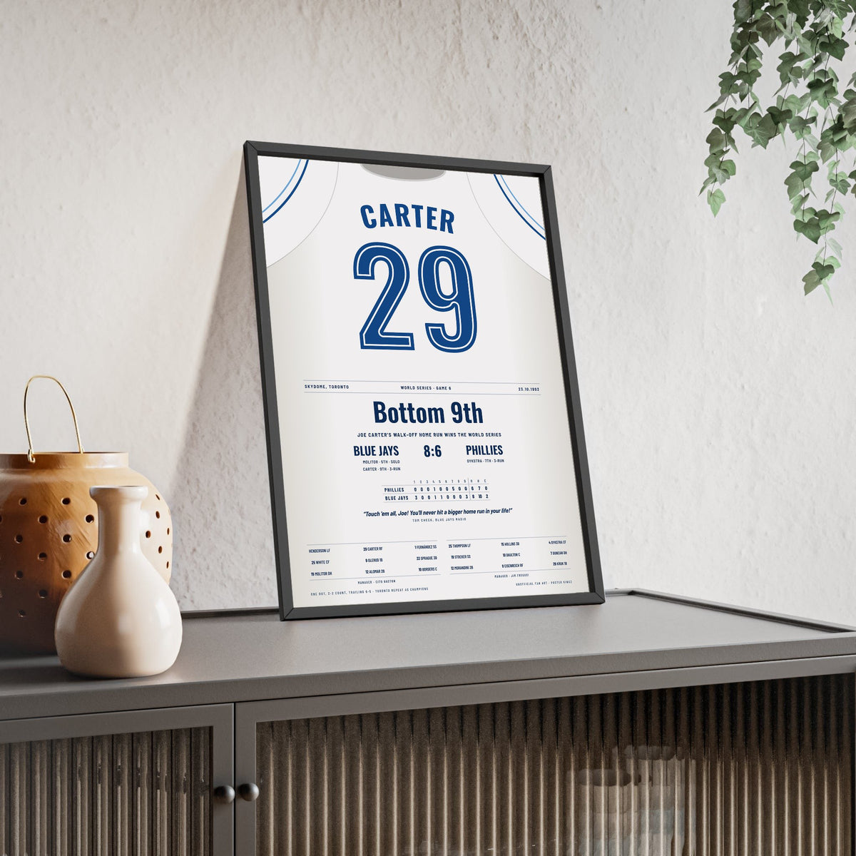 Joe Carter 1993 World Series Walk-Off Home Run Poster - Toronto Blue Jays 29 Jersey Print framed and leaning on a sideboard
