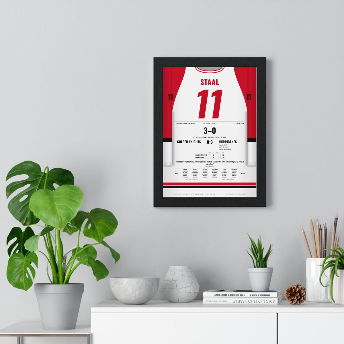 Jordan Staal 2026 Cup Final Game 6 Poster - Carolina Hurricanes 11 Hockey Jersey Print framed on a living room wall