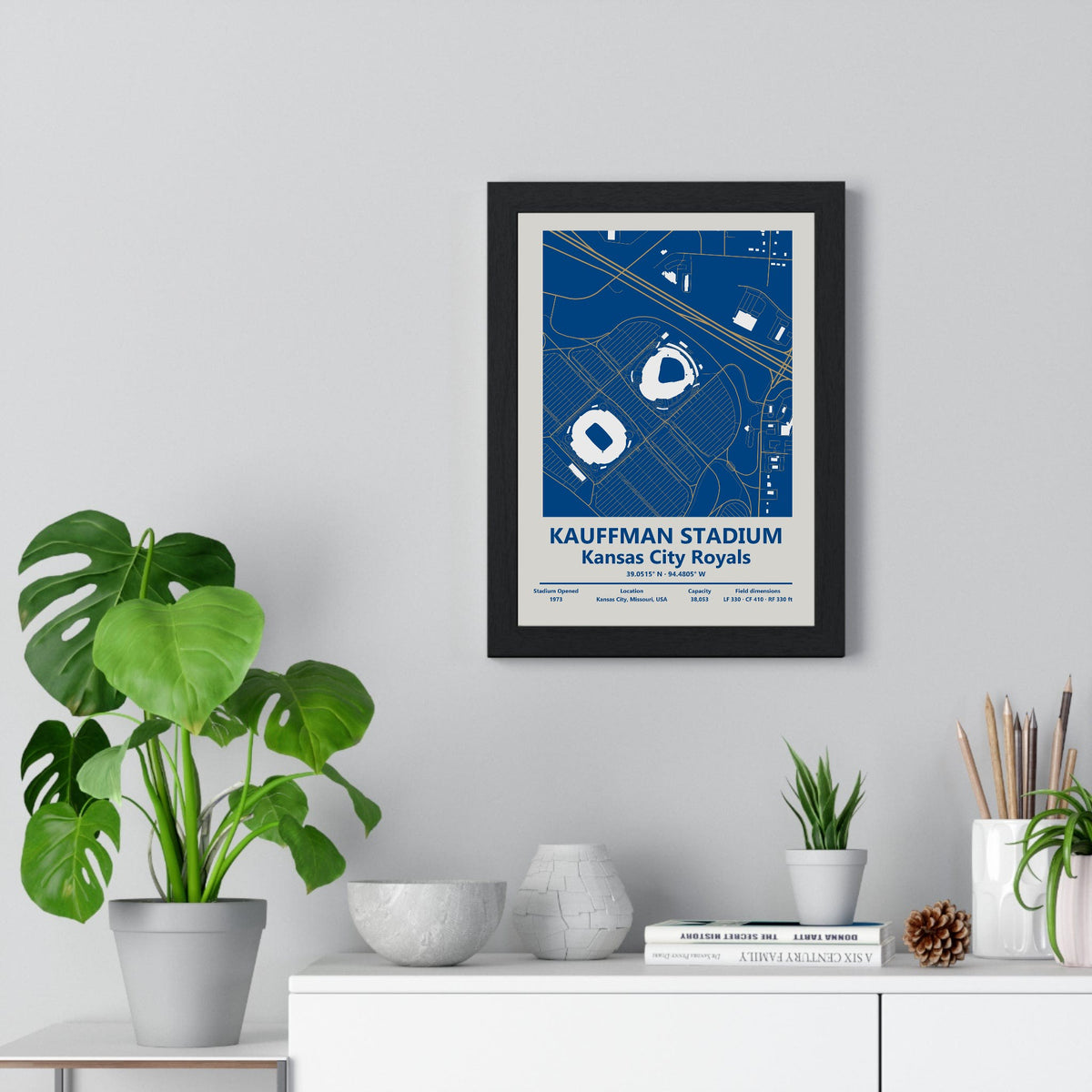 Kauffman Stadium map print framed on a living room wall