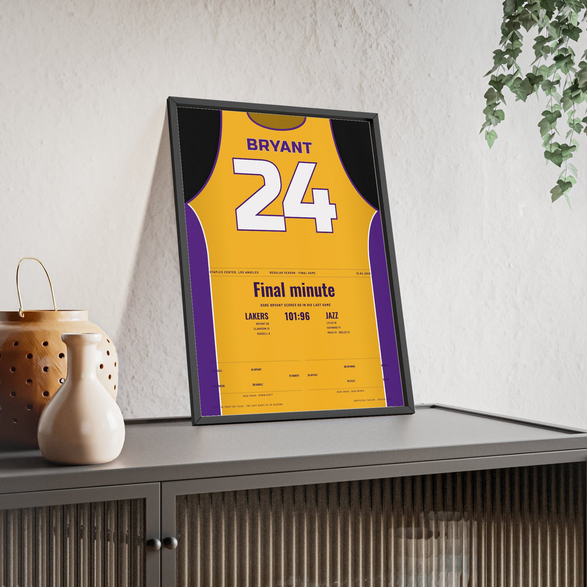 Kobe Bryant Final Game 60 Points 2016 Poster - Los Angeles Lakers 24 Gold Jersey Print framed and leaning on a sideboard