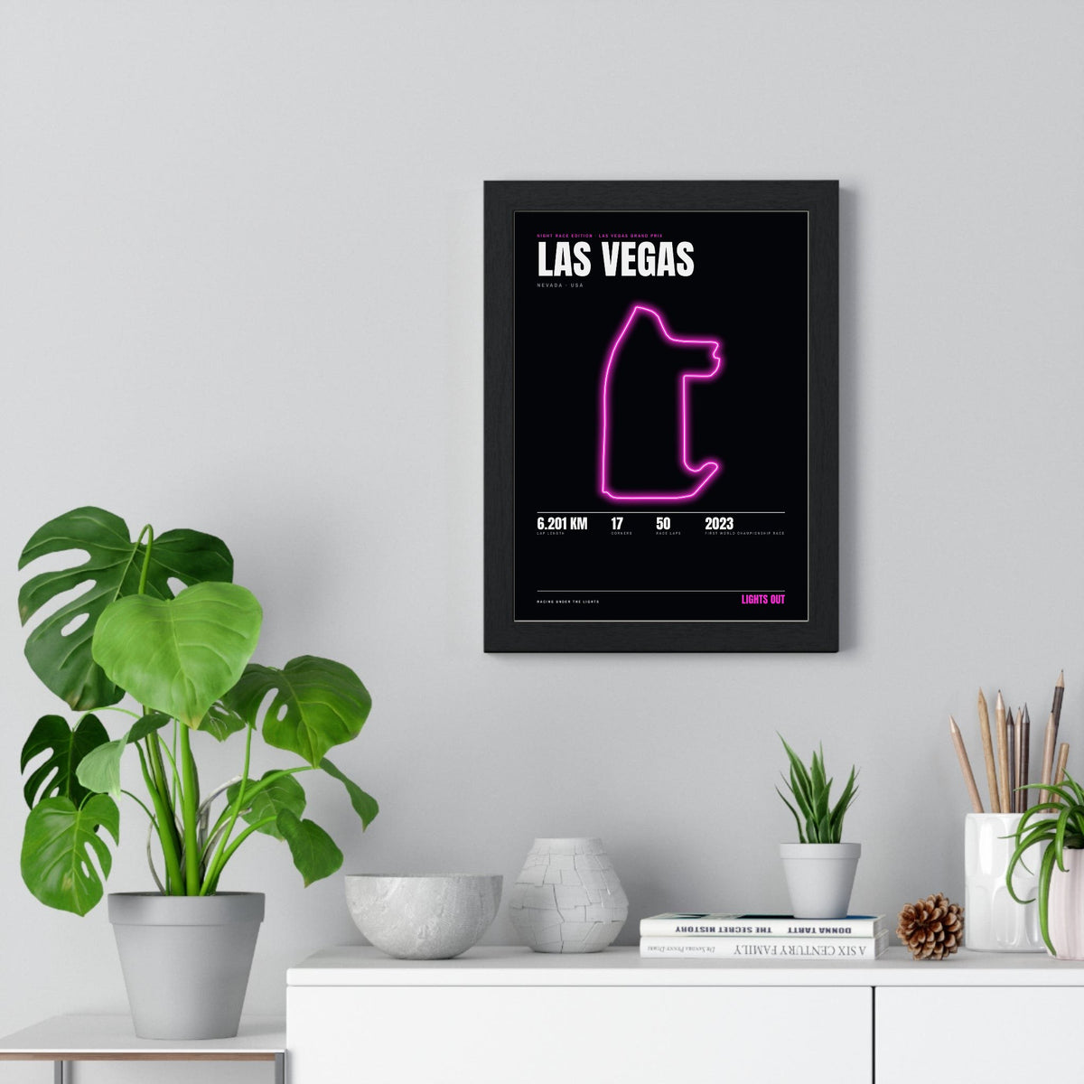 Las Vegas Night Race print framed on a living room wall