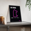 Las Vegas Night Race print framed and leaning on a sideboard