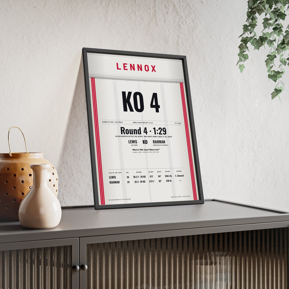 Lewis v Rahman 2001 Boxing Poster framed and leaning on a sideboard