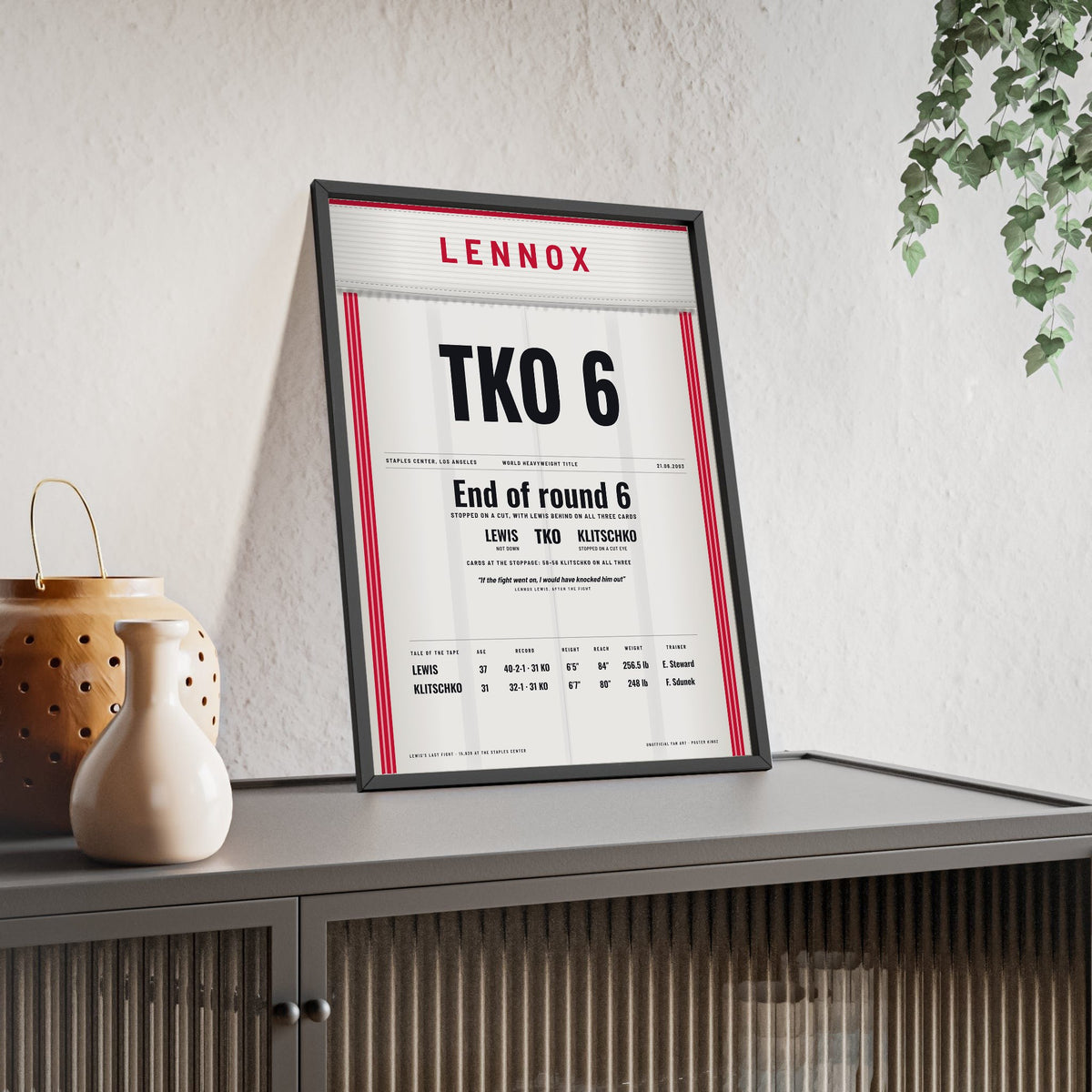 Lewis v Klitschko 2003 Boxing Poster framed and leaning on a sideboard