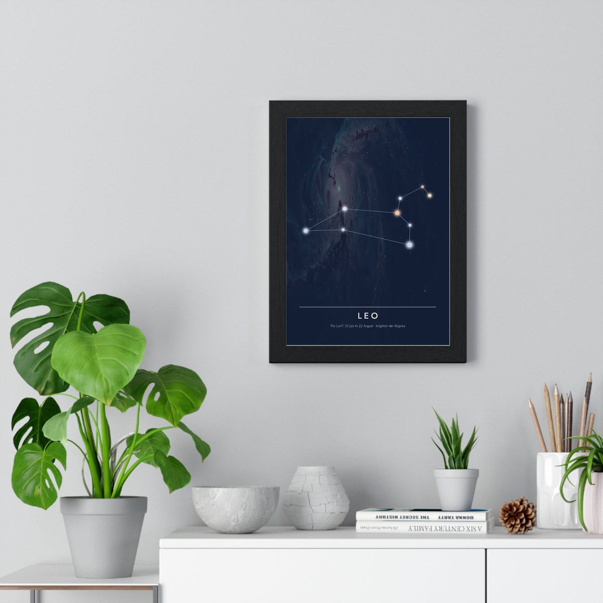 Leo Constellation print framed on a living room wall