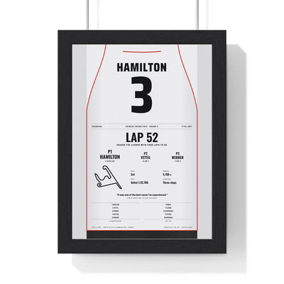 Lewis Hamilton 2011 Chinese Grand Prix Win Poster - 3 Race Suit Print framed in a black frame, ready to hang