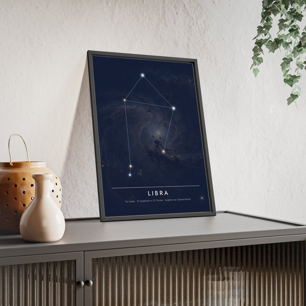 Libra Constellation print framed and leaning on a sideboard