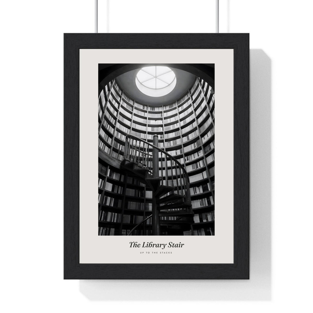 Library Spiral Staircase Print - Home Office Wall Art framed in a black frame, ready to hang
