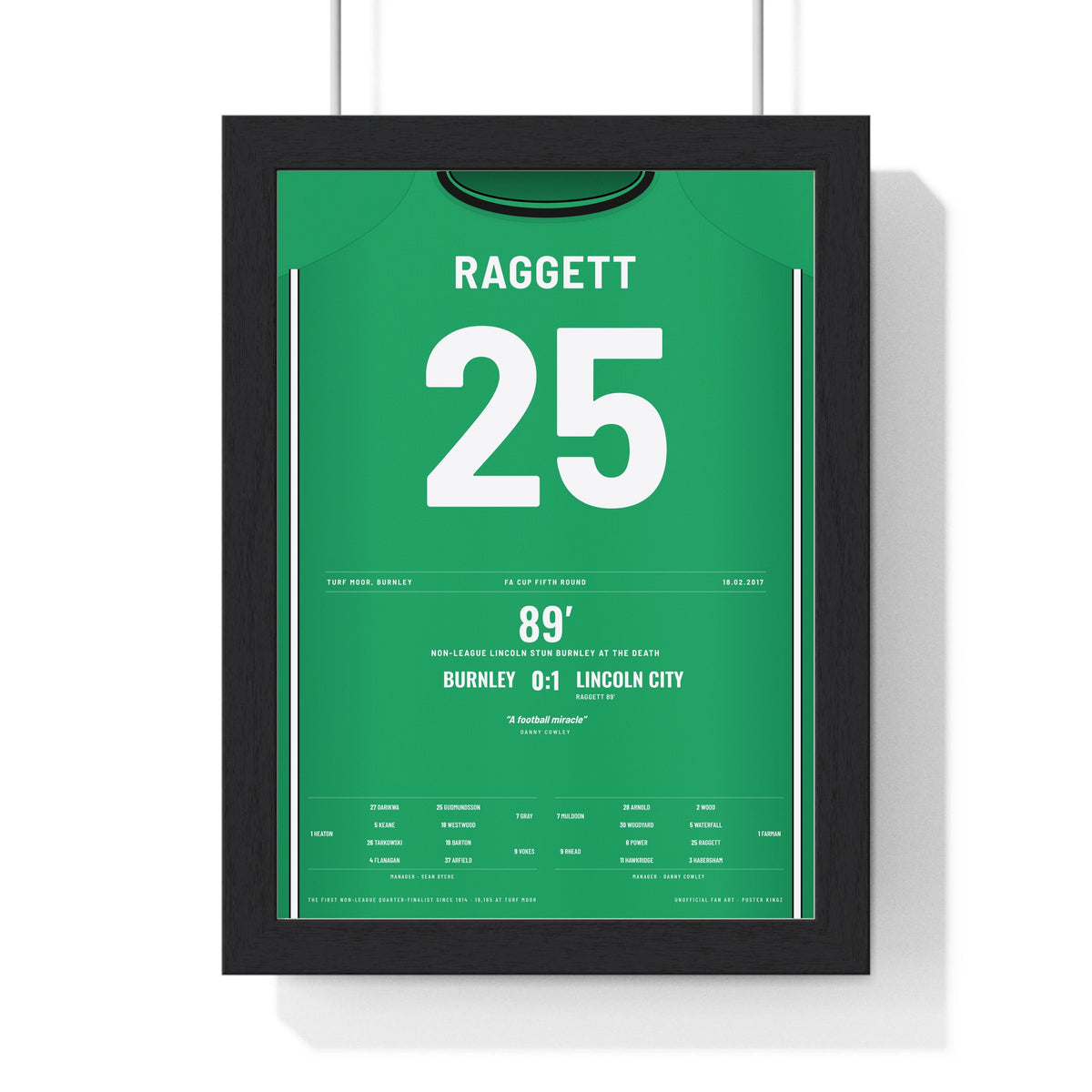 Lincoln City FA Cup 2017 Poster - Sean Raggett 25 Turf Moor Winner Shirt Print framed in a black frame, ready to hang