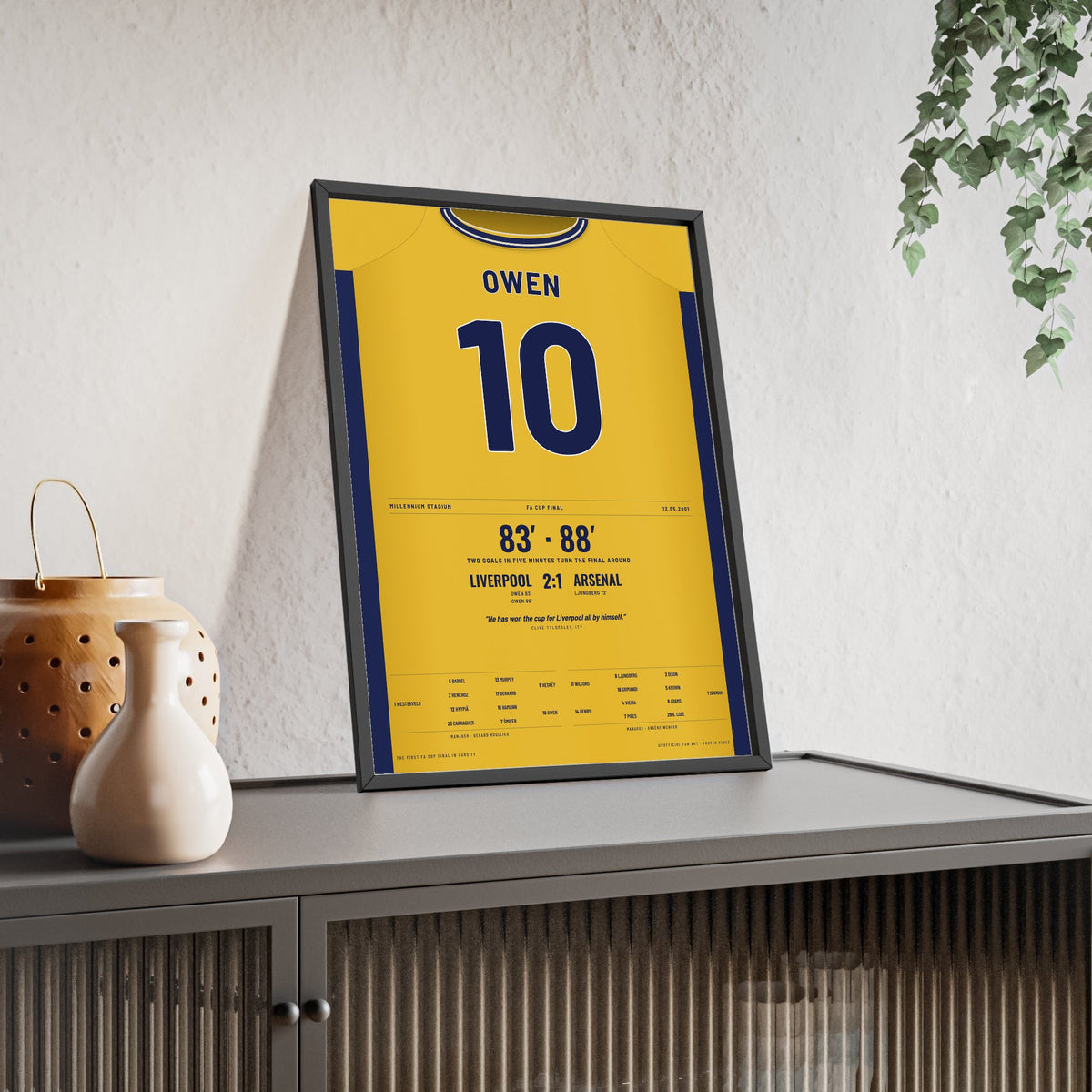 Liverpool FA Cup Final 2001 Poster - Michael Owen 10 Cardiff Winner Shirt Print framed and leaning on a sideboard