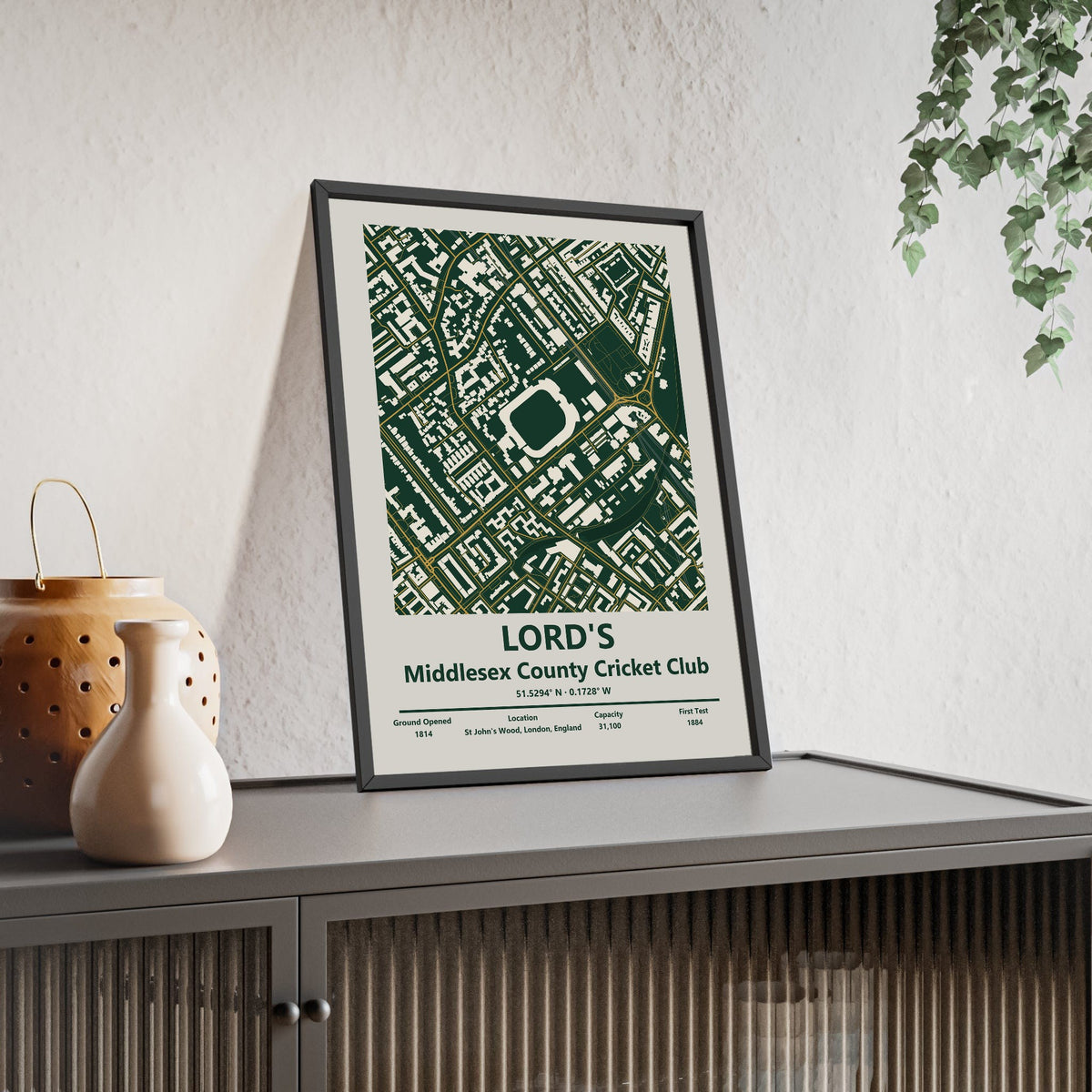 Lord's map print framed and leaning on a sideboard