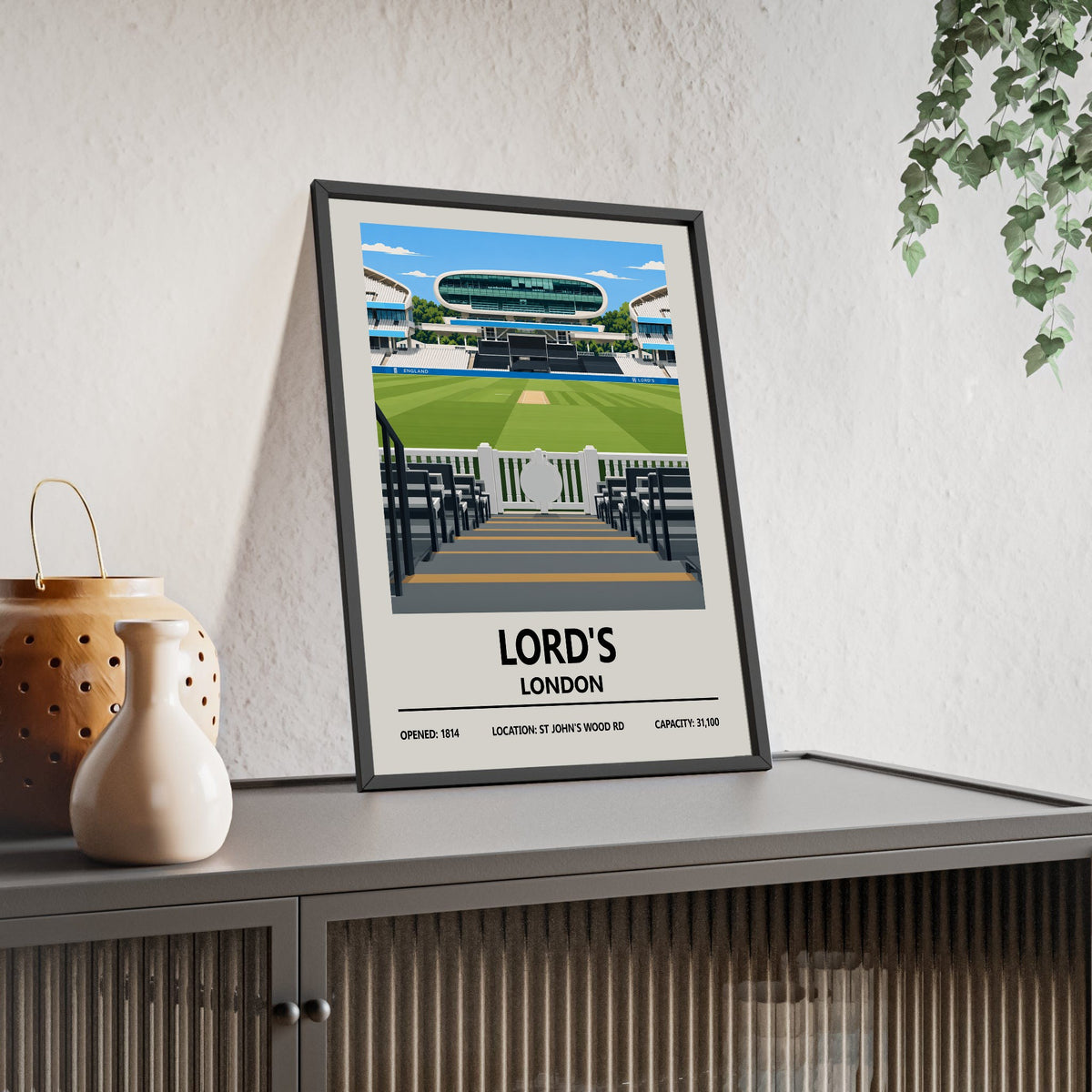 Lord's cricket ground print framed and leaning on a sideboard