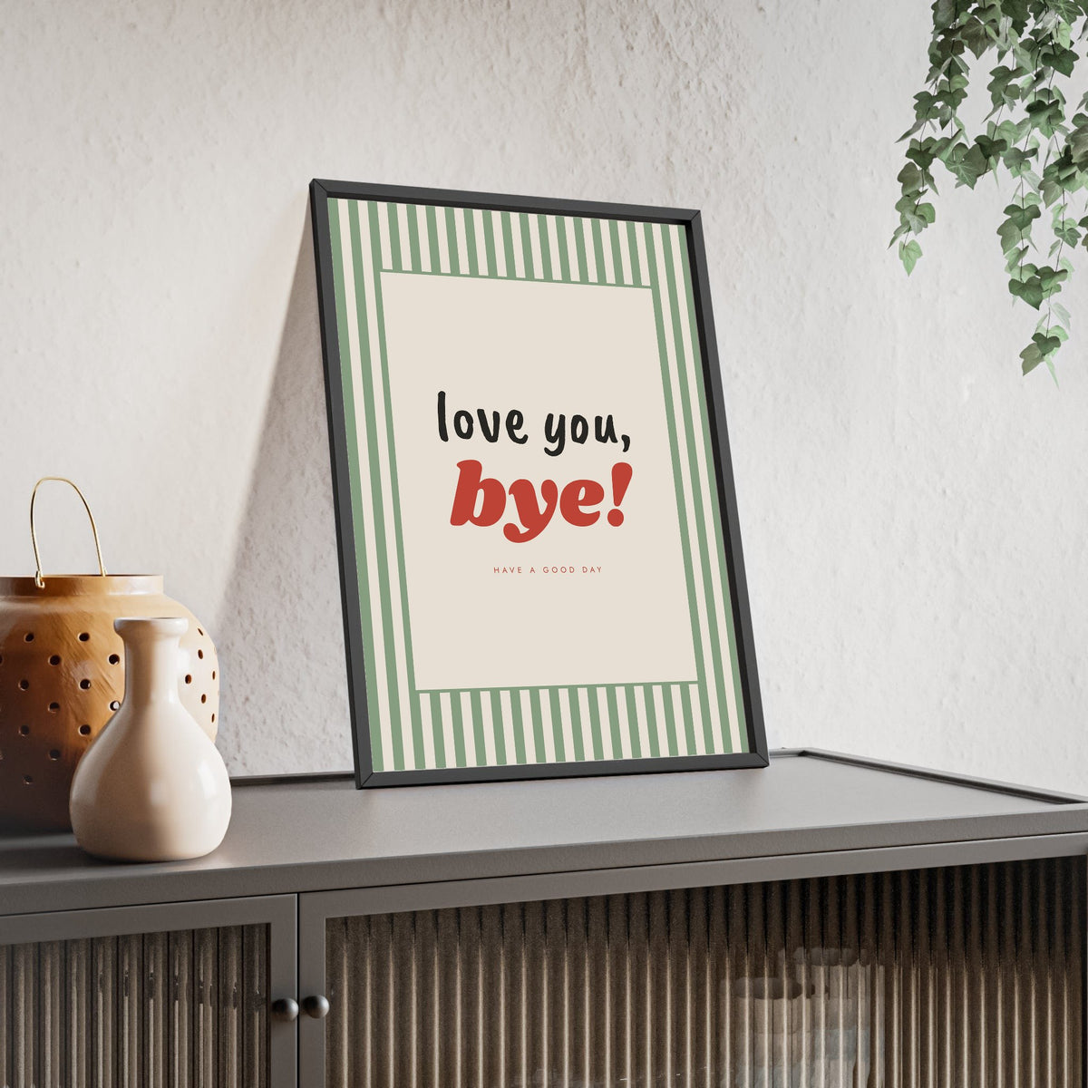 Love You Bye Print framed and leaning on a sideboard