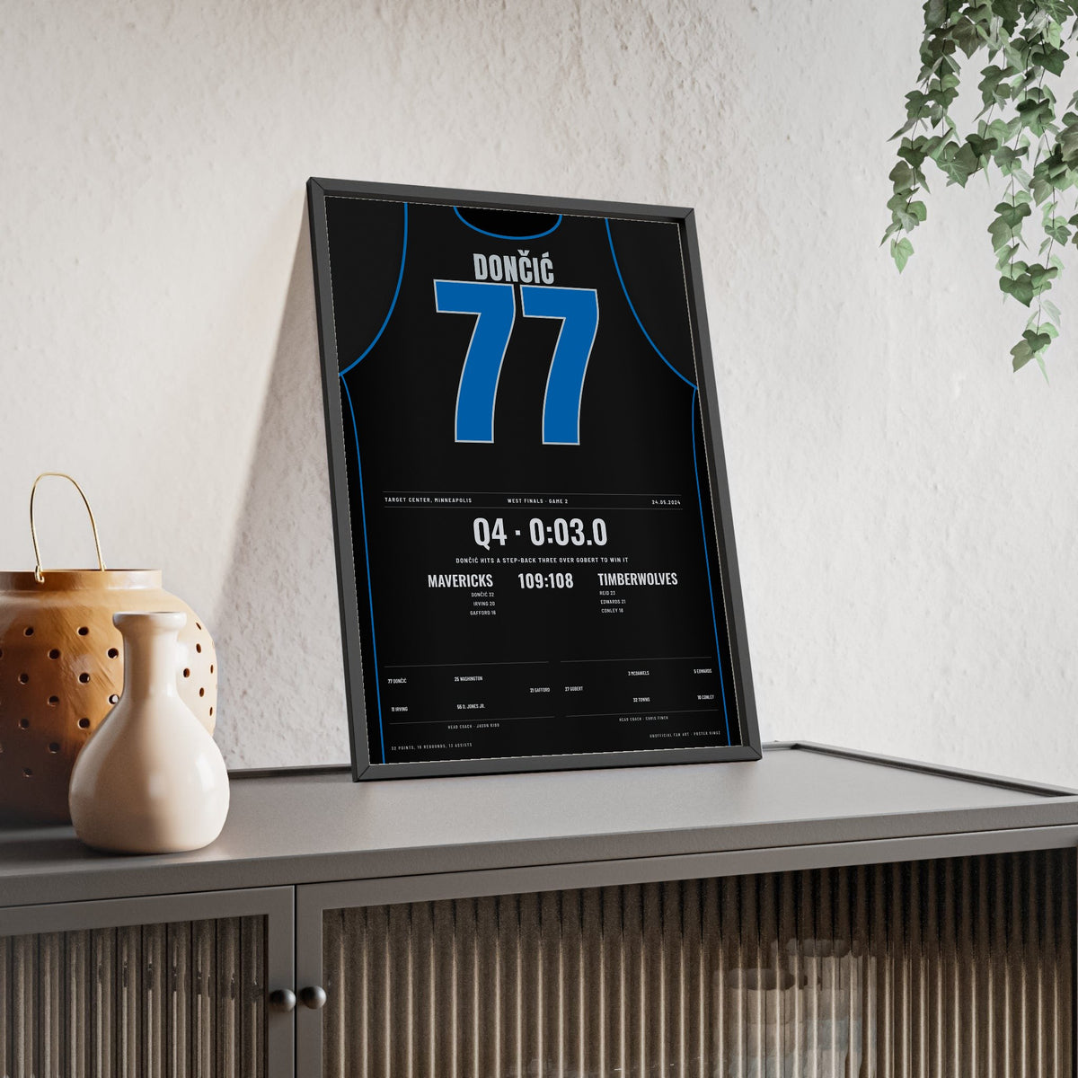 Luka Dončić 2024 West Finals Game 2 Poster - Dallas Mavericks 77 Game-Winner Jersey Print framed and leaning on a sideboard