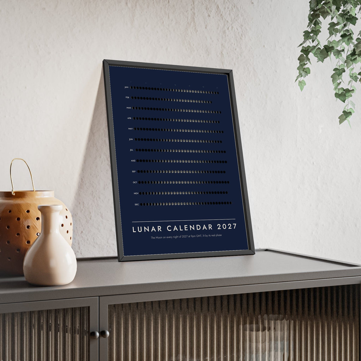 Lunar Calendar 2027 print framed and leaning on a sideboard