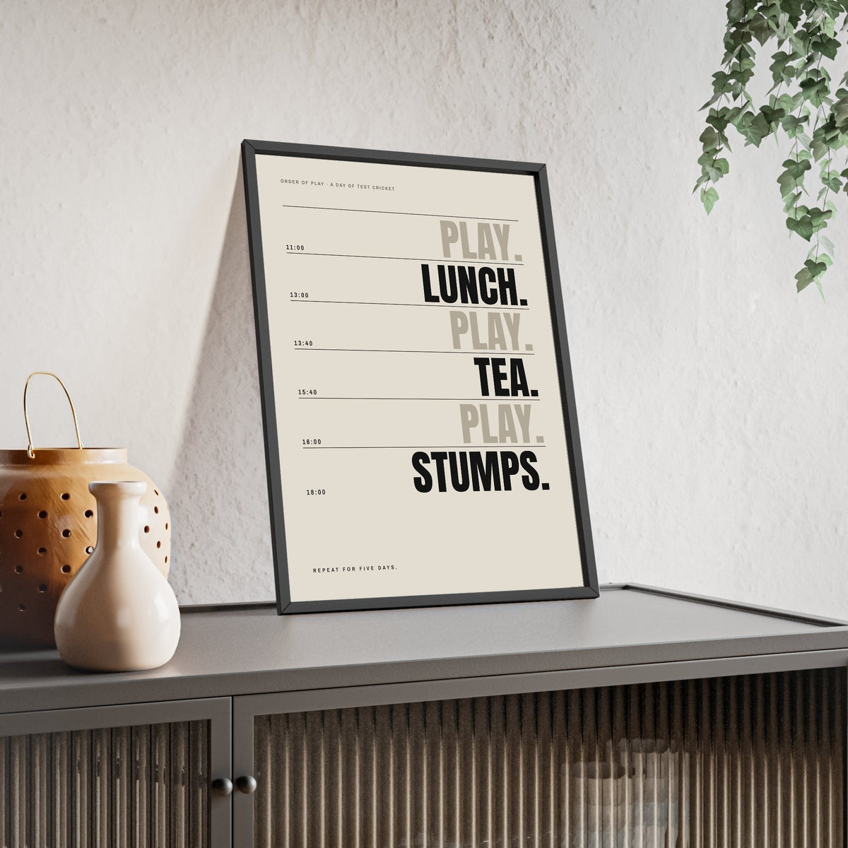 Lunch Tea Stumps Cricket print framed and leaning on a sideboard
