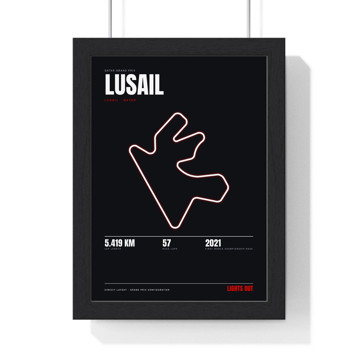 Lusail Circuit print framed in a black frame, ready to hang