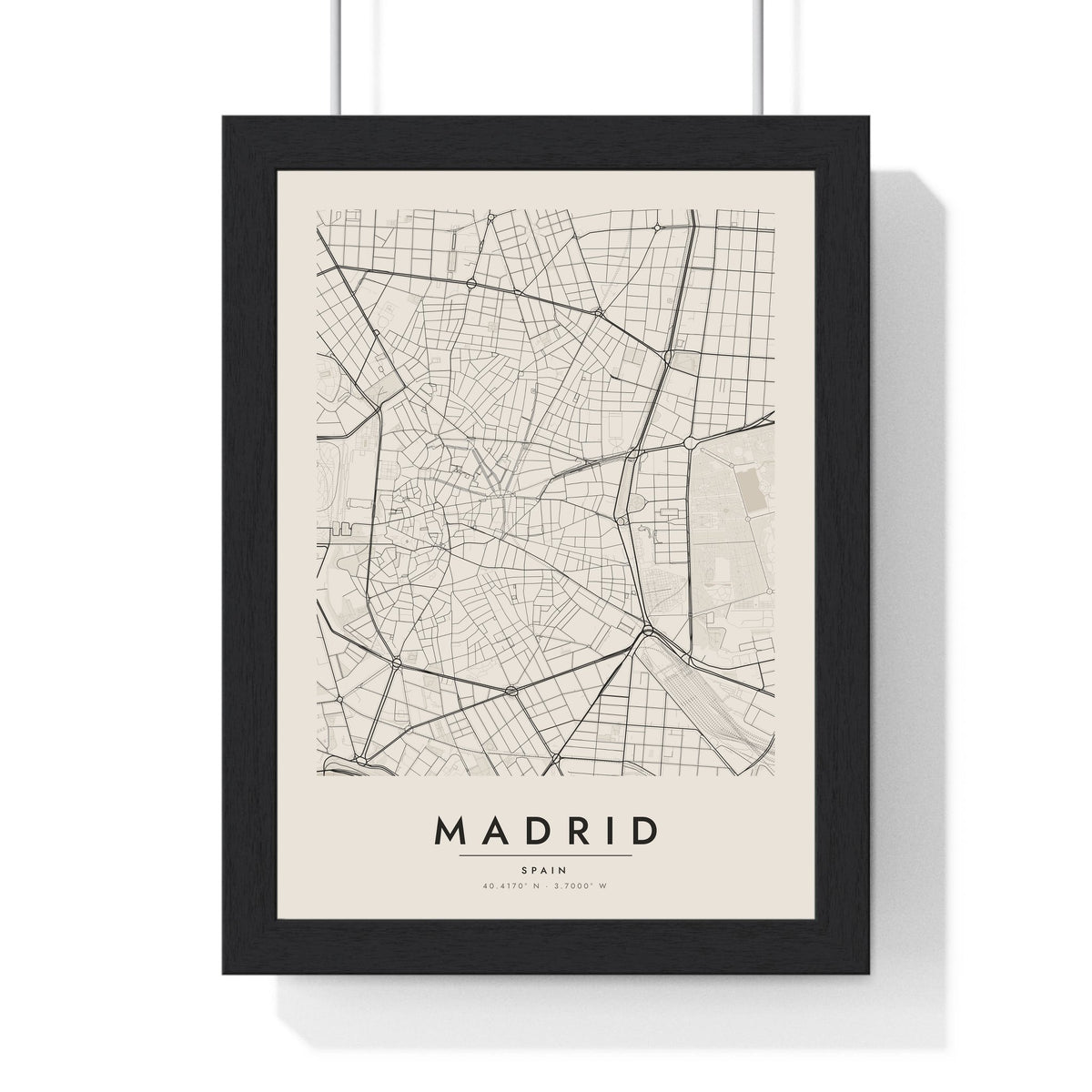 Madrid street map poster in cream, minimal city map print framed in a black frame