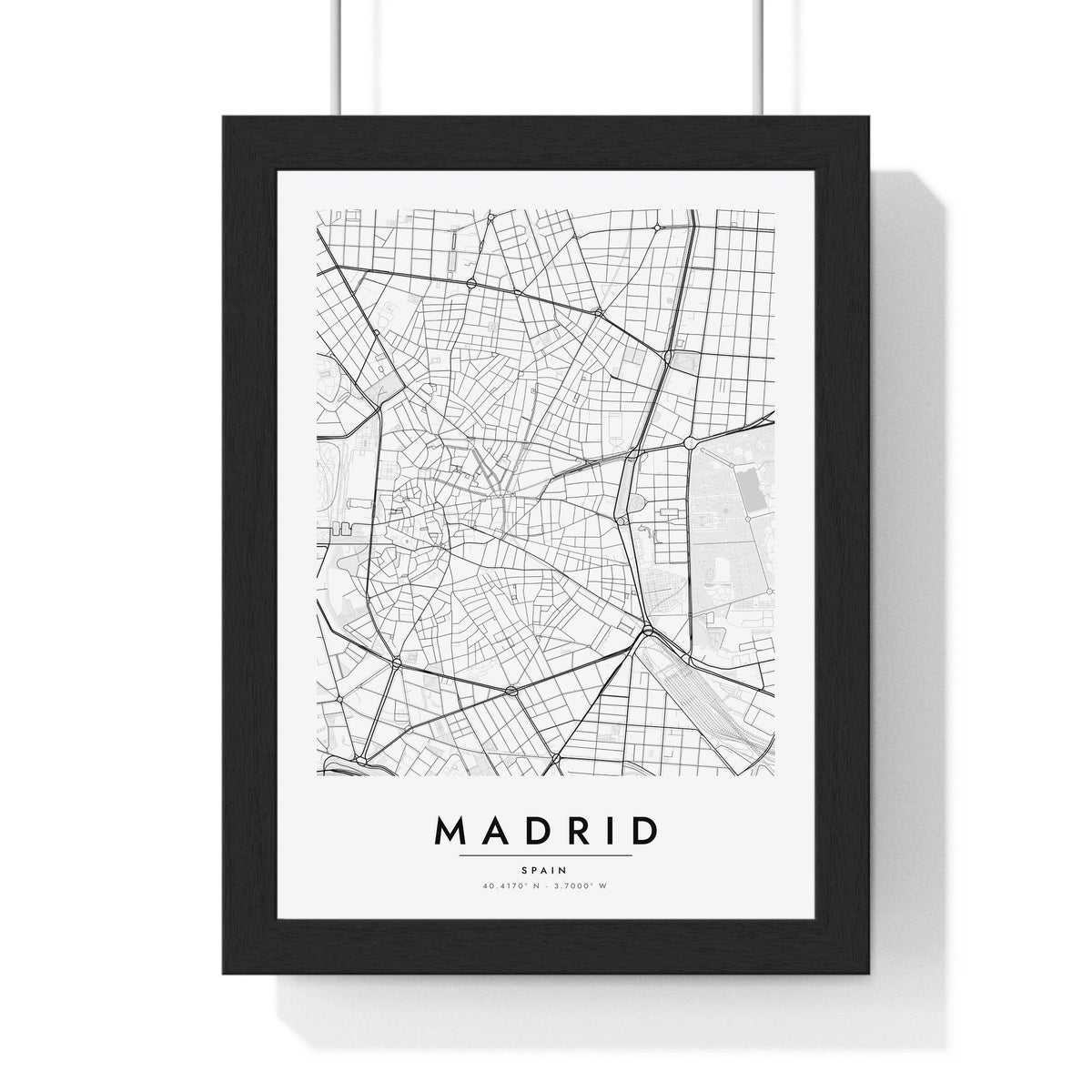 Madrid street map poster in white, minimal city map print framed in a black frame