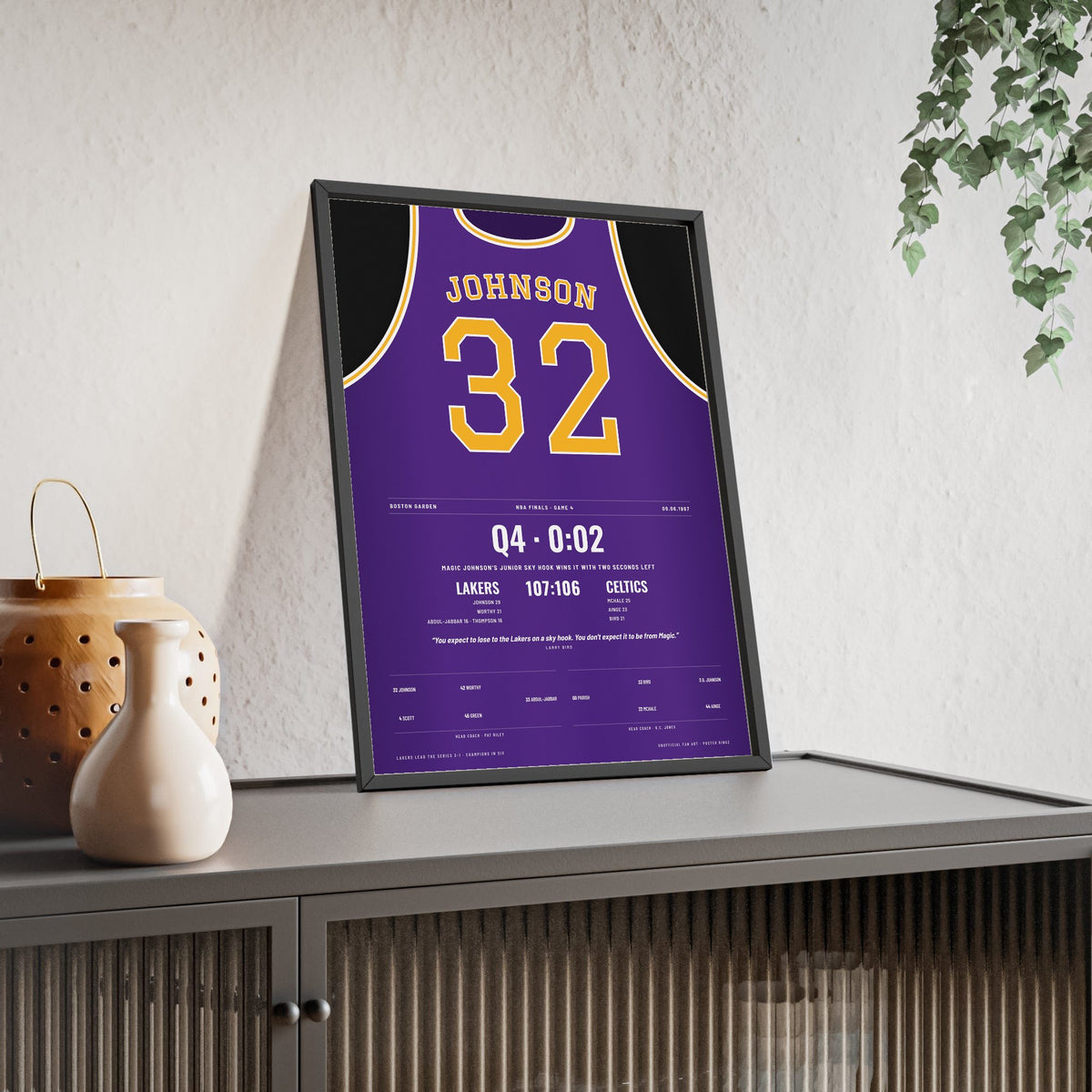 Magic Johnson 1987 NBA Finals Game 4 Poster - Los Angeles Lakers 32 Junior Sky Hook Jersey Print framed and leaning on a sideboard